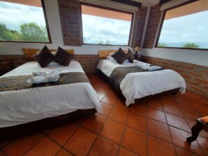 Room description balcony to cotopaxi inn ecuador sincholagua room15
